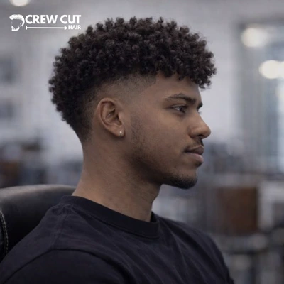 Curly burst fade haircut with sponge curls