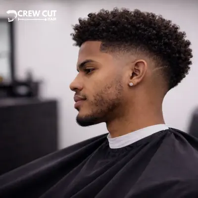 Low taper burst fade curly hair
